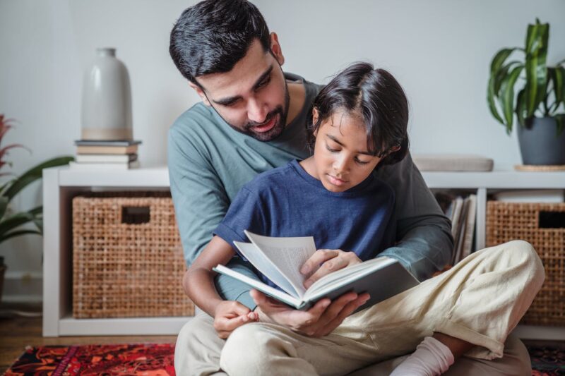 PH-EN-Website-Passivhaus-Father-Son-Reading Father and son reading in the living room