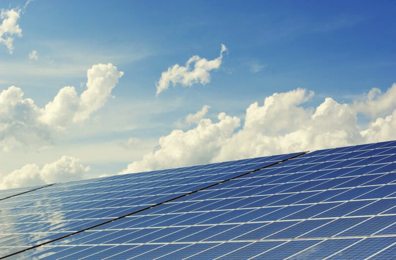 PH-EN-Website-Passivhaus-Solar-Panels Solar panels on a sunny day with a clear sky.